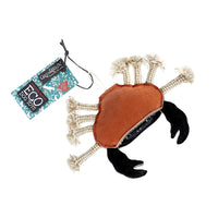 A brown and black, crab-shaped dog toy made from eco-friendly materials. The toy has rope legs and a tag that says 'GREEN&WILD's ECO DOG TOYS'.